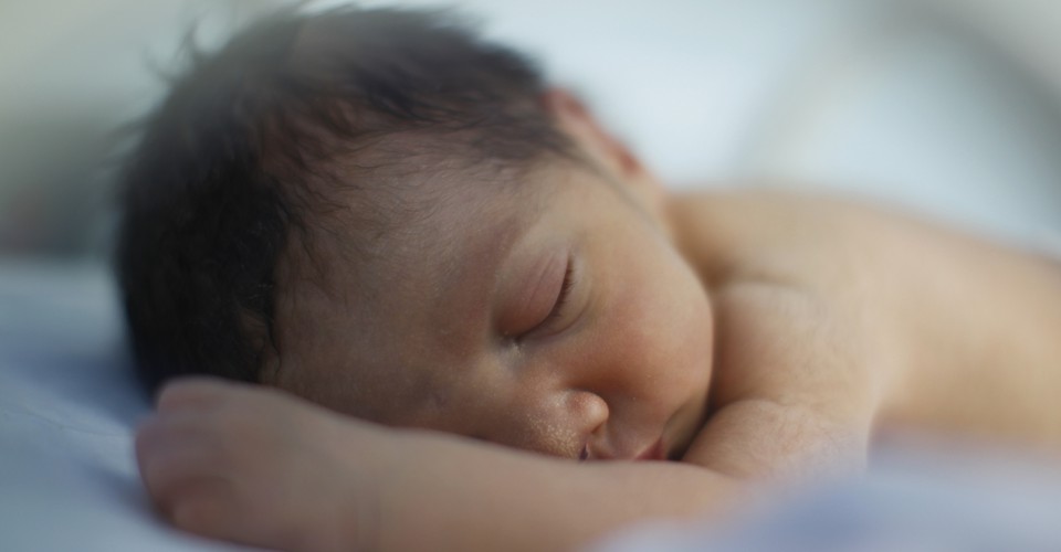 A premature baby sleeps in an incubator in the natal intensive care unit in a public maternity hospital in Gatire