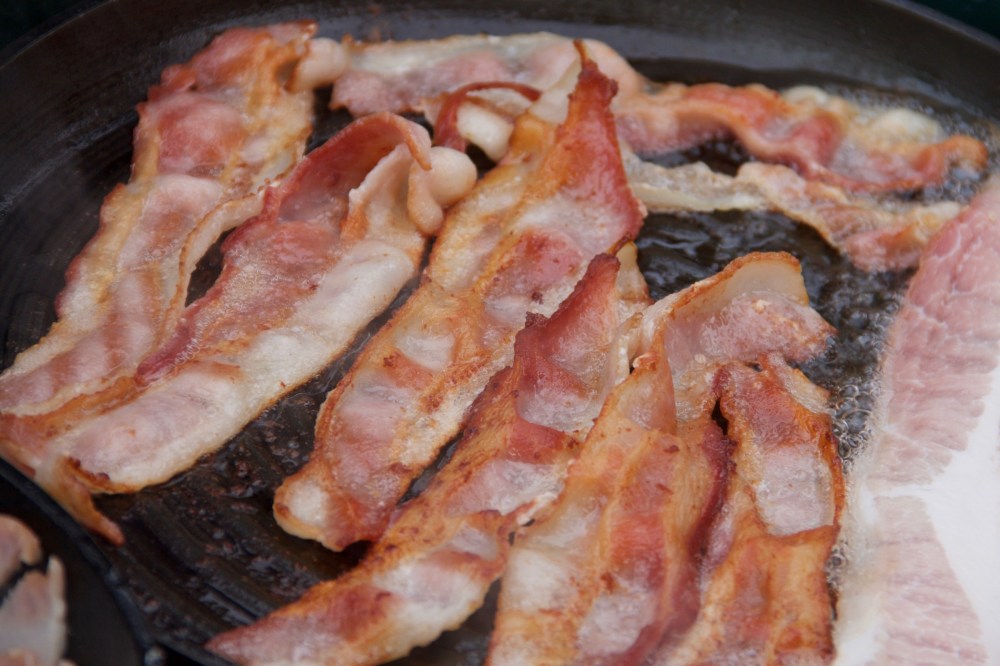 bacon-strips-cooking-frying-pan